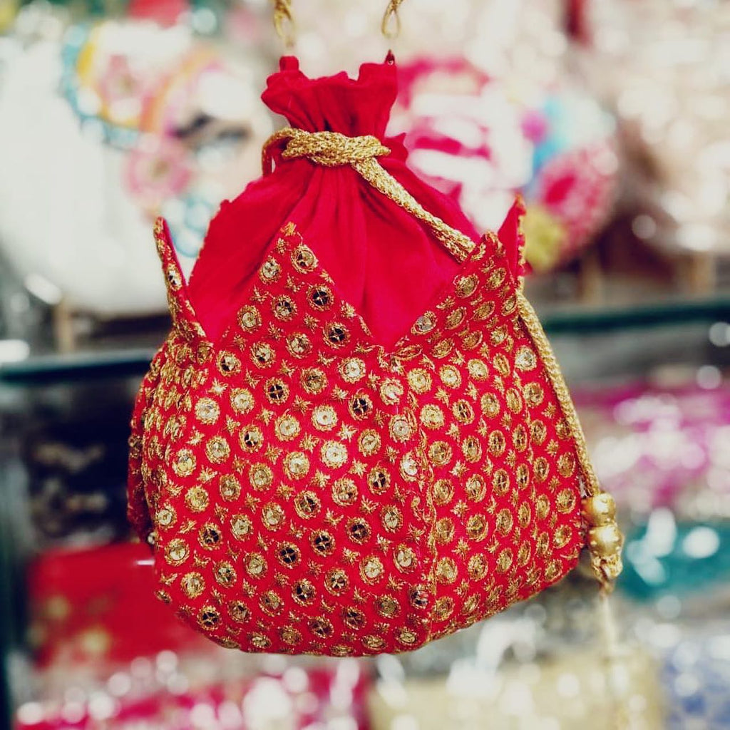 Lotus style potli clutches from...