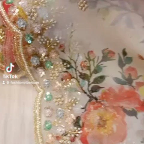 Oraganza saree with handwork and floral prints